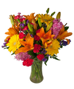 Orange autumnal bouquet with lilies, daisies, and so much more!