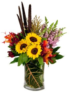 sunflowers and assorted flowers in vase